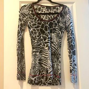 Black and white scoop neck shirt with pink stitching